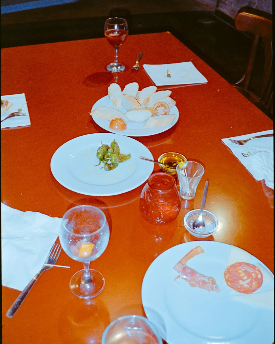 Red dining table scene photographed with flash.
