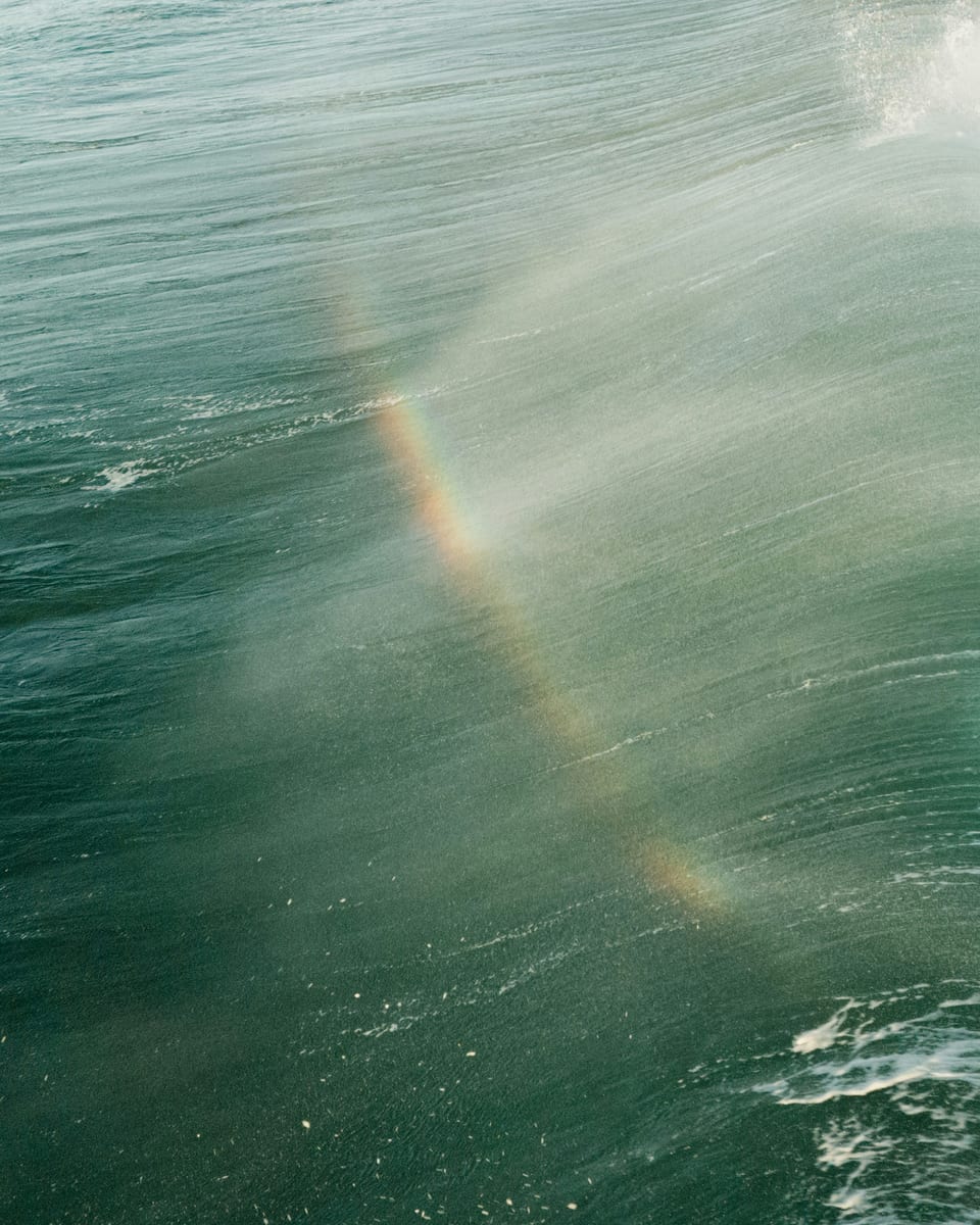 Ocean spray with rainbow